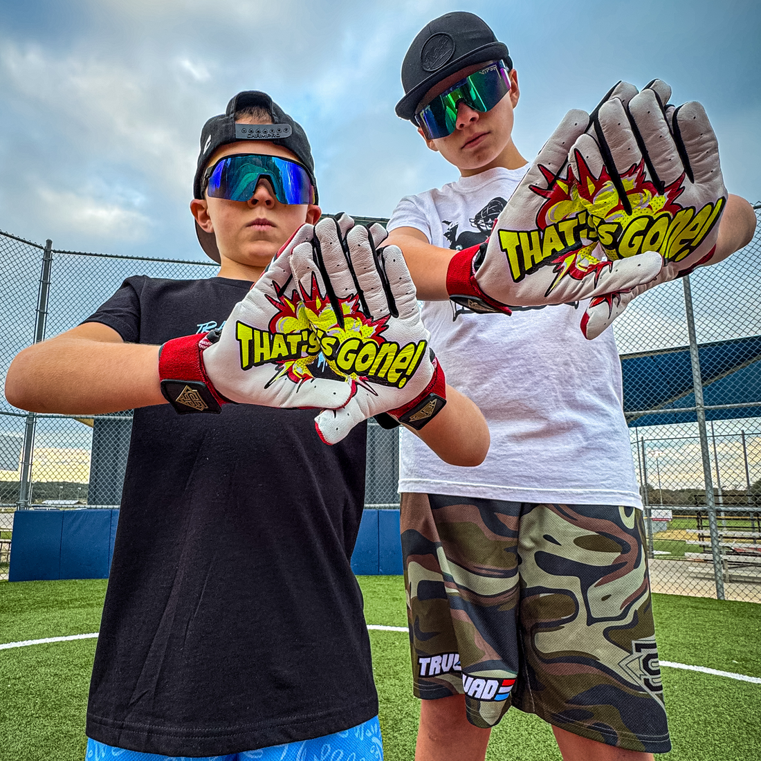 Close-up of TRVL SQUAD Origins batting gloves showing cabretta leather palm and grip texture