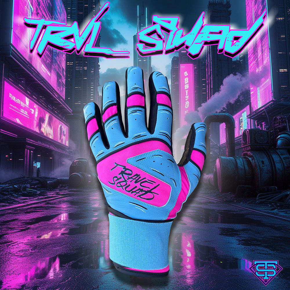 A pair of Candy Crushers baseball batting gloves with a 'Comic Hands' design in blue and pink colors, displayed in a neon-lit urban environment.