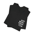 Folded black t-shirt with white text on a white background