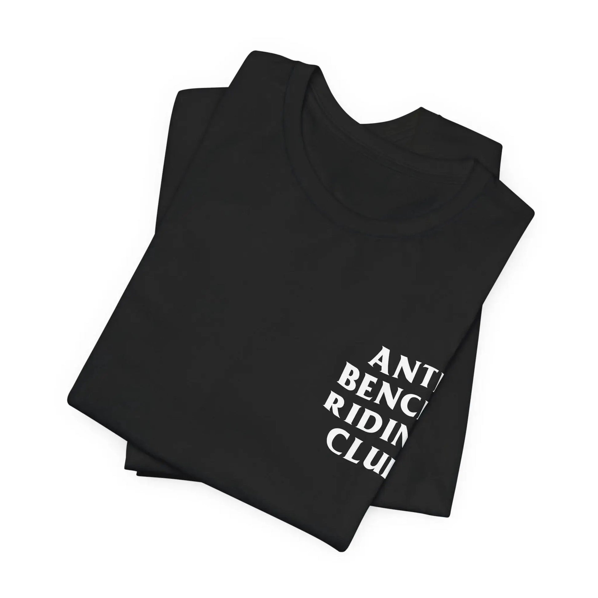 Folded black t-shirt with white text on a white background