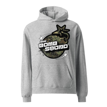 A gray oversized hoodie with a camouflage pattern on the front and 'BOMB SQUAD' text along with a graphic logo on the right chest area.