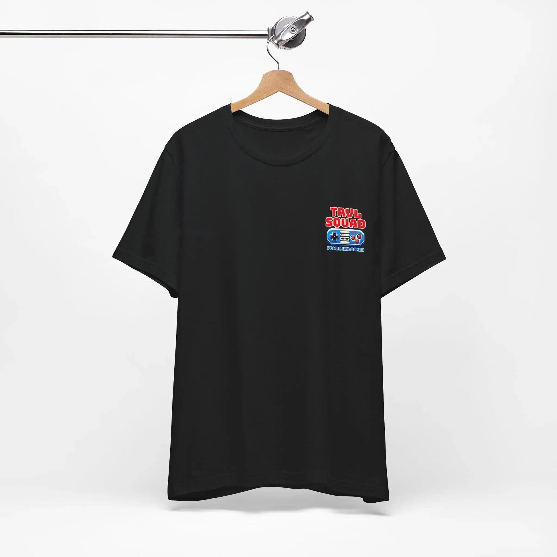 Black t-shirt with a colorful graphic on a hanger against a white background