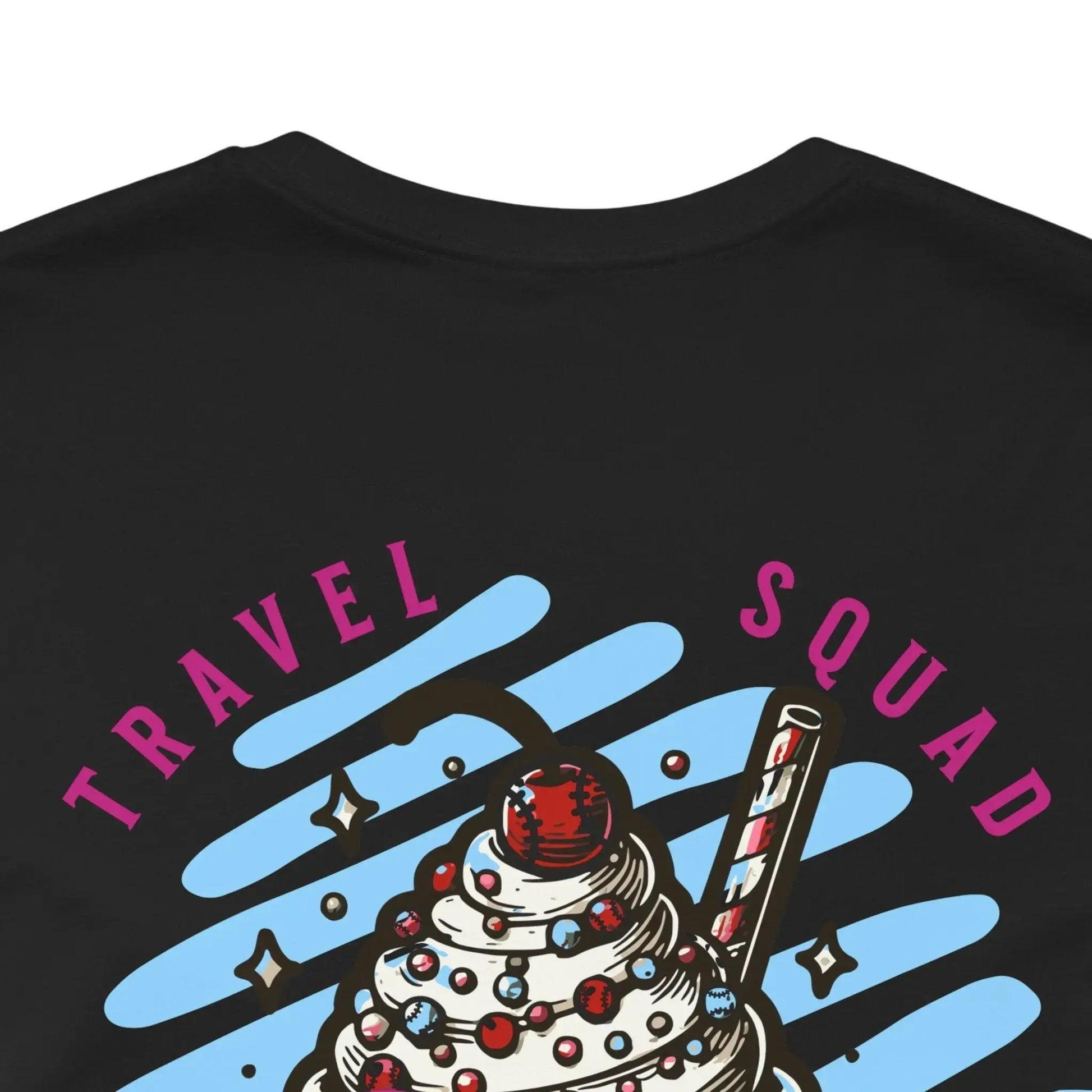 Black t-shirt with 'Travel Squad' graphic design featuring a cake and travel-themed elements.