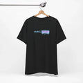 Black t-shirt with a colorful graphic on a hanger against a white background