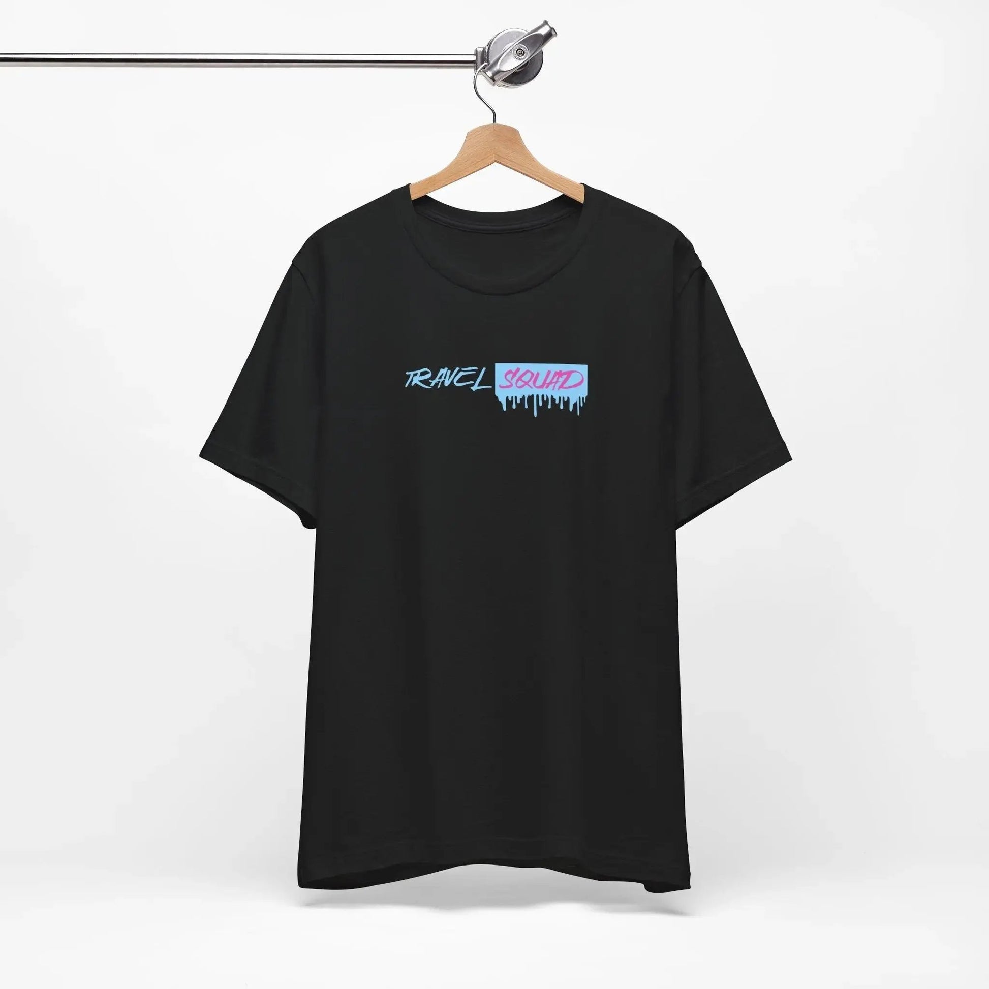 Black t-shirt with a colorful graphic on a hanger against a white background