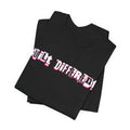 Black t-shirt with 'BUILT DIFFERENT' text in pink and white on a white background