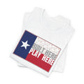 White t-shirt with Texas flag design and text 'Built Here Play Here' on a white background