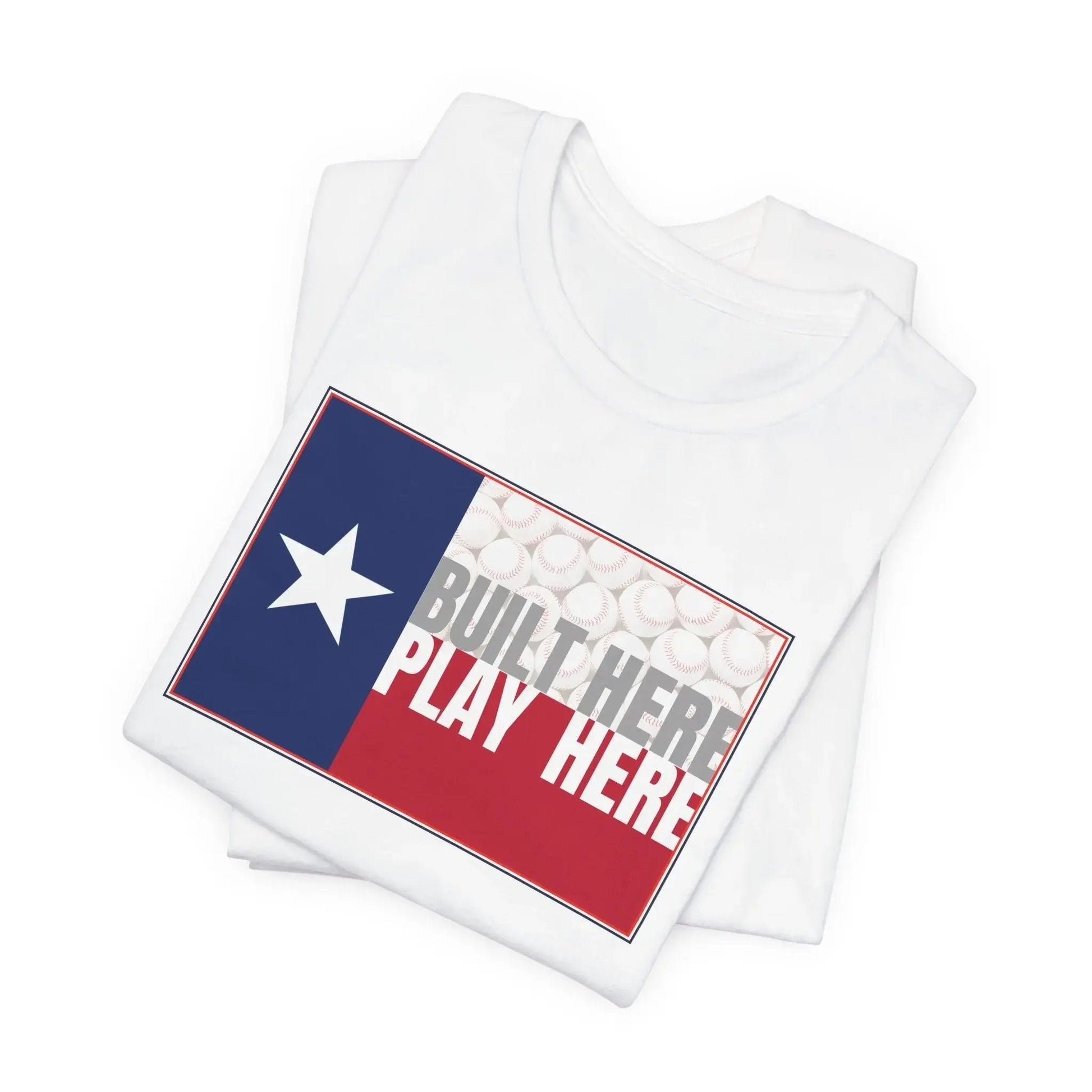 White t-shirt with Texas flag design and text 'Built Here Play Here' on a white background
